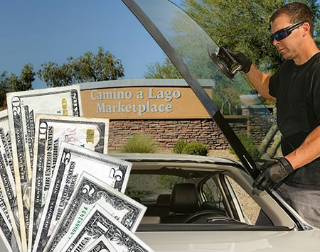 Technician fixing glass on Camino A Lago street