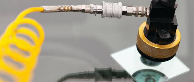 Pumping resin into a windshield to repair a chip