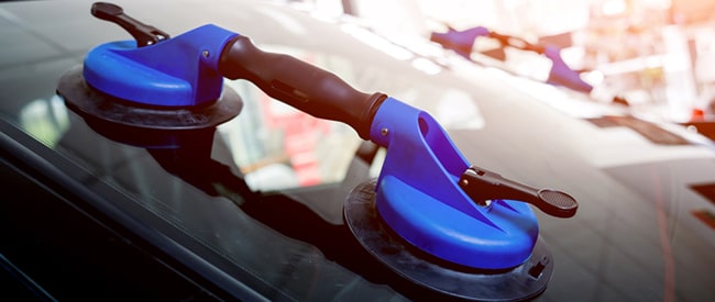 Technician injecting resin into repair equipment