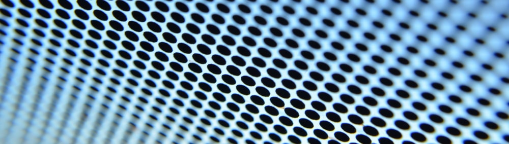 Dots on windshield shade band