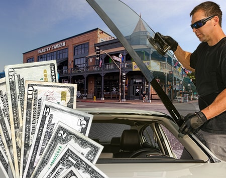 Technician fixing glass on Downtown Tempe street