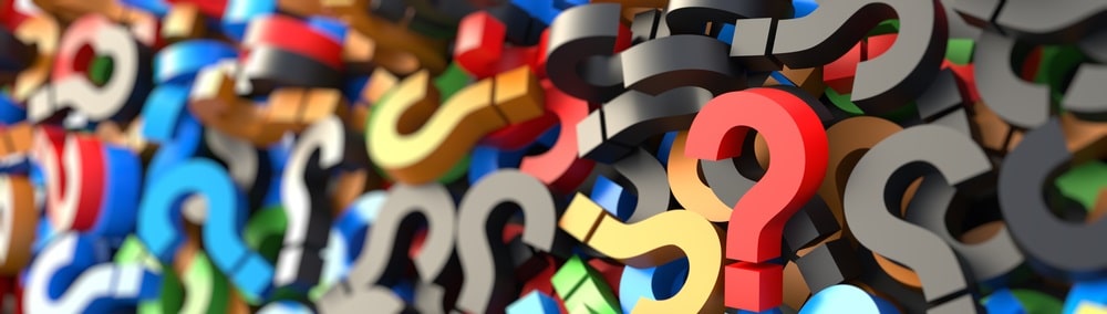 Illustrated pile of question marks