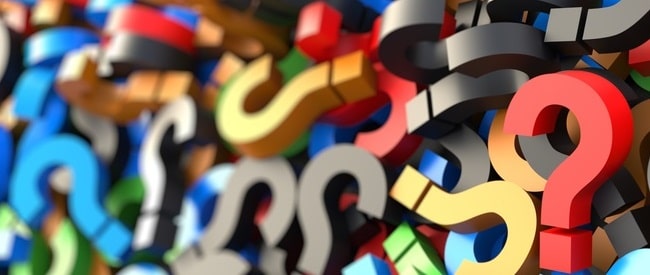 Illustrated pile of question marks