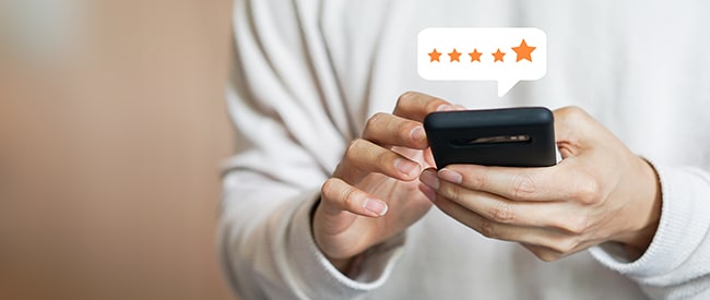 Man reviewing business on phone