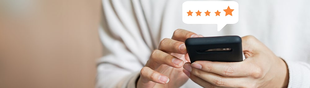 Man reviewing business on phone