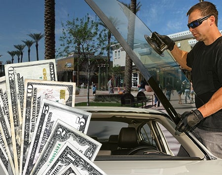 Technician fixing glass on Mesa Riverview street