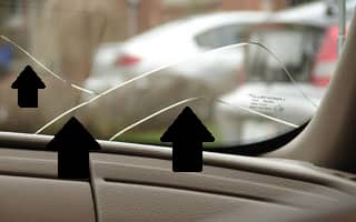 Windshield with multiple large cracks