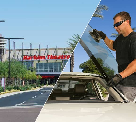 Mobile auto glass technician replacing a windshield at Park West Mall in Peoria, AZ