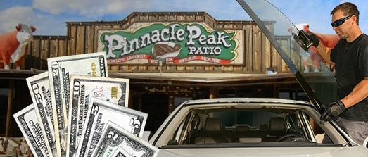 Technician fixing glass on Pinnacle Peak street