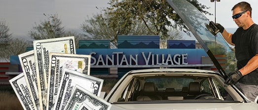Technician fixing glass on San Tan Village street