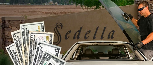 Technician fixing glass on Sedella street
