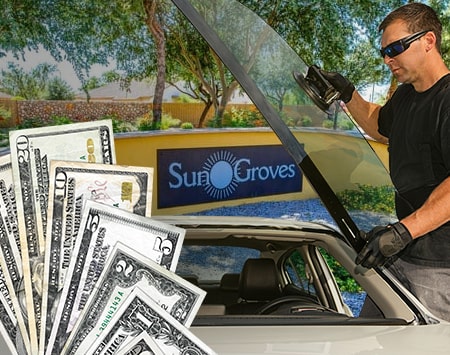 Technician fixing glass on Sun Groves street