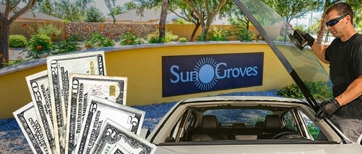 Technician fixing glass on Sun Groves street