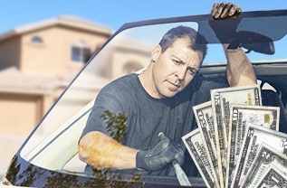 Technician holding windshield