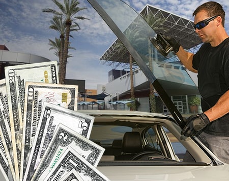 Technician fixing glass on Tempe Marketplace street