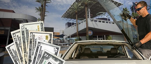 Technician fixing glass on Tempe Marketplace street