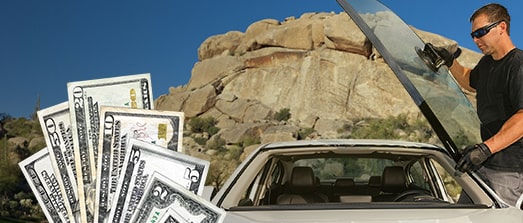 Technician fixing glass on The Boulders street