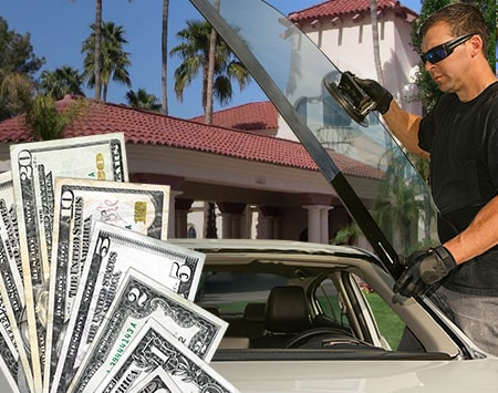 Technician fixing glass on Val Vista Lakes street