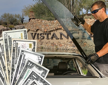 Technician fixing glass on Vistancia street